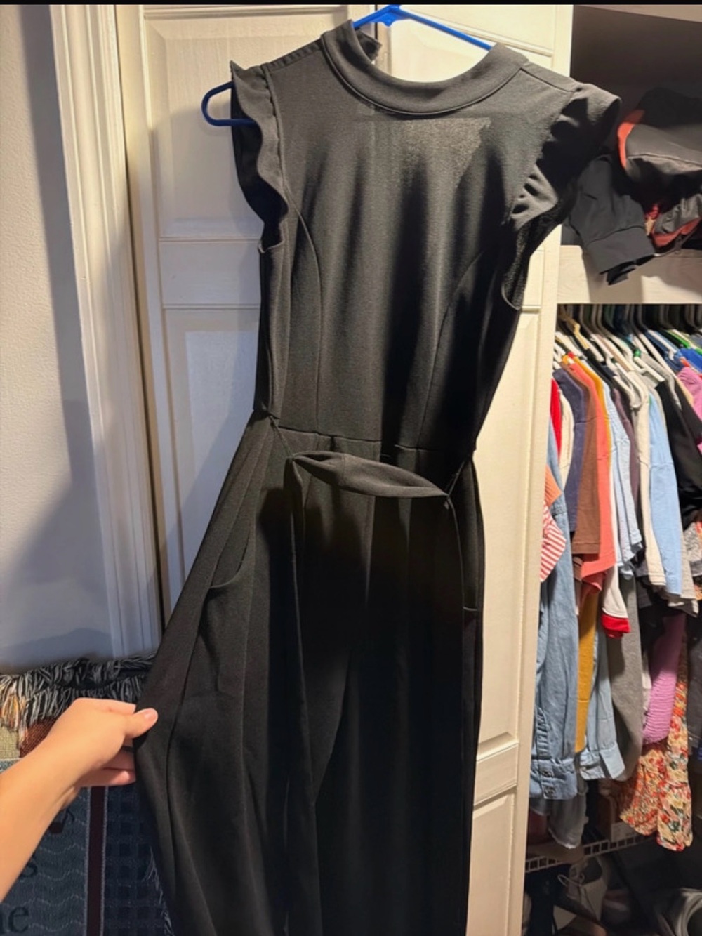 Sleeveless Black Jumpsuit with Flutter Shoulder Detail